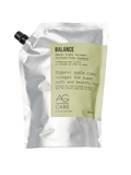 AG Care Balance Apple Cider Vinegar shampoo pouch on a gray background